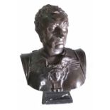 After the Antique; a modern black painted plaster bust of a Roman Emperor, 78cm high.