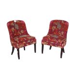 A set of four 20th century hardwood framed dining chairs,