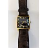 A Waltham 9ct gold square cased gentleman's automatic wristwatch, with a jewelled movement,