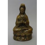 A Chinese bronze figure of Guanyin, 19th century, seated in dhyanasana on a double lotus base, 19.