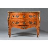 A Louis XV style commode, the marble top over a gilt metal mounted walnut bombe two drawer base,