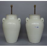 A pair of modern pottery table lamps, each white glaze of two handled Grecian urn form, 45cm high,