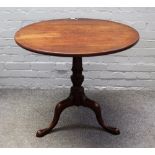 An 18th century mahogany circular tilt top table on tripod base, 79cm wide x 72cm high.
