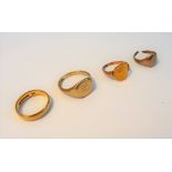 An 18ct gold wedding ring, 5.8gms, a 9ct gold signet ring Birmingham 1942, 7.