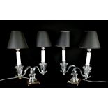 A pair of silvered metal and glass three light table lamps, 31cm wide,