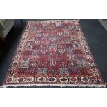 A Bakhtiari tile carpet, Persian, the field with various design in individual compartments,
