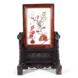 An early 20th century Chinese hardwood table screen, pre-1918, with hardstone inlaid plaque,