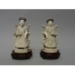 A pair of Chinese ivory figures of an Emperor and Empress, early 20th century,