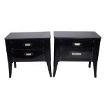 A pair of 20th century ebonised and glass two drawer side cabinets, on splayed supports,