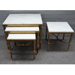 A nest of three 20th century lacquered brass occasional tables with marble inset tops on reeded