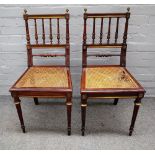 A pair of 19th century French brass mounted mahogany side chairs,