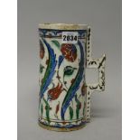 An Iznik pottery cylindrical tankard, Ottoman Anatolia, first half 17th century,