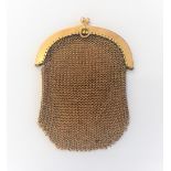 A lady's gold chain mesh purse, the semi-circular undecorated mounts detailed 9ct, on a snap clasp,