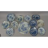 A large Chinese blue and white plate, Qianlong, painted with branches of flowering peony and fruit,