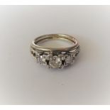 A diamond three stone ring,