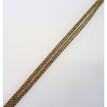 A gold faceted circular link long guard chain, detailed 9 CT, length 151cm, weight 18.8 gms.