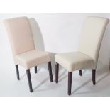 A set of three 20th century hardwood framed dining chairs on tapering supports.