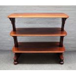 A Victorian mahogany three tier buffet on bun feet, 123cm wide x 110cm high.