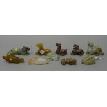 A group of ten Chinese archaistic figures of animals, nine of jade, the other in agate, largest 6cm.