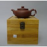 A Chinese Yixing stoneware teapot and cover, 20th century,