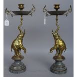 A pair of late 19th century French animalier candlesticks in the manner of Fantin-Latour,