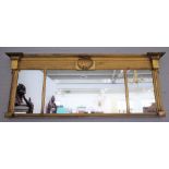 An early Regency gilt framed triple plate overmantel mirror with shell moulded frieze and cluster