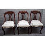 A set of eight 19th century mahogany framed slipper back dining chairs,