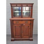 A late 19th century mahogany side cabinet, with pair of glazed doors,