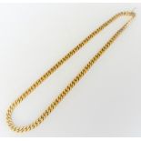 A gold faceted curb link neckchain, on a snap clasp, detailed 14 K 585, weight 73 gms.
