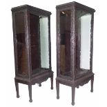 A pair of late 19th century carved mahogany and hardwood display cabinets,