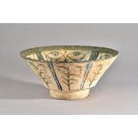 A Kashan pottery bowl, Persia, 13th century, with straight flared sides,