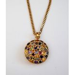 A gold and varicoloured gemstone set pendant, of circular abstract form,