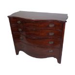 A George III mahogany serpentine commode, with four long graduated drawers, on bracket feet,