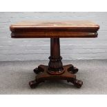 A William IV mahogany card table, on turned column and four scroll feet, 93cm wide x 72cm high.