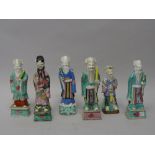 A group of six Chinese famille-rose Immortals, late 18th/early 19th century,