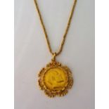 An Edward VII sovereign 1907, in a gold pendant mount, of Middle Eastern design,