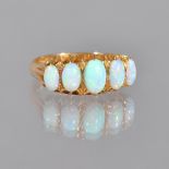 An 18ct gold and opal set five stone ring,