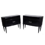 A pair of 20th century black painted side cabinets, with fluted edges on tapering supports,