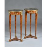 A pair of Empire Revival torchere stands,
