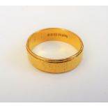 A 22ct gold wedding ring, ring size R, weight 6 gms.