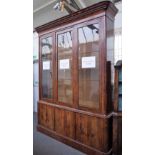 A 19th century French mahogany side cabinet, with three glazed doors, over cupboards,