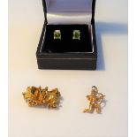 A pair of 9ct gold, peridot and diamond earstuds,