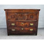 A 17th century Continental walnut mule chest with lidded top over two long drawers on block feet,