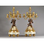 In the manner of Henry Dasson, a pair of French bronze,