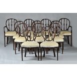A set of twelve George III style mahogany framed dining chairs,