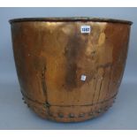 A Victorian copper log bin with rivetted seams,