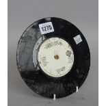 Jim Lambie, (b.1964) Untitled (eye to eye) vinyl record, wool and glue, 17.5cm dia.