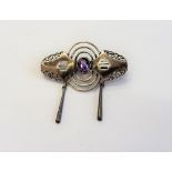 A Christian Seybold silver and amethyst single stone brooch, in an Art Deco design,