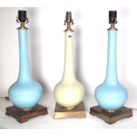 A pair of duck egg blue porcelain bottle neck vases converted to table lamps,