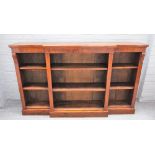 A Victorian walnut floor standing breakfront open bookcase on plinth base, 183cm wide x 112cm high.